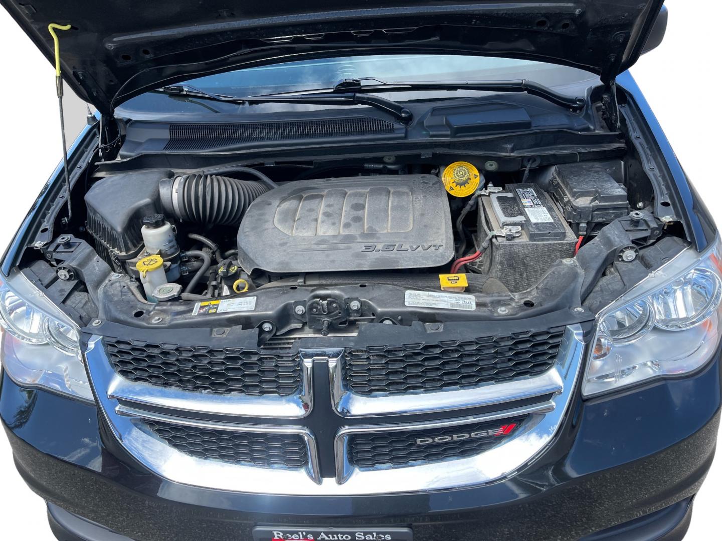 2019 Black /Black Dodge Grand Caravan SE (2C4RDGBG6KR) with an 3.6L V6 DOHC 24V engine, 6A transmission, located at 547 E. Main St., Orwell, OH, 44076, (440) 437-5893, 41.535435, -80.847855 - This 2019 Dodge Grand Caravan SE presents a practical and spacious option for families or travelers needing room for seven passengers. Powered by the robust 3.6L Pentastar V6 engine paired with a 6-speed automatic transmission, it delivers a smooth and reliable driving experience. This model boasts - Photo#13